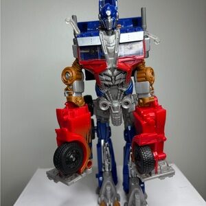 Transformer Robot Action Figure - Red, Blue, and Silver